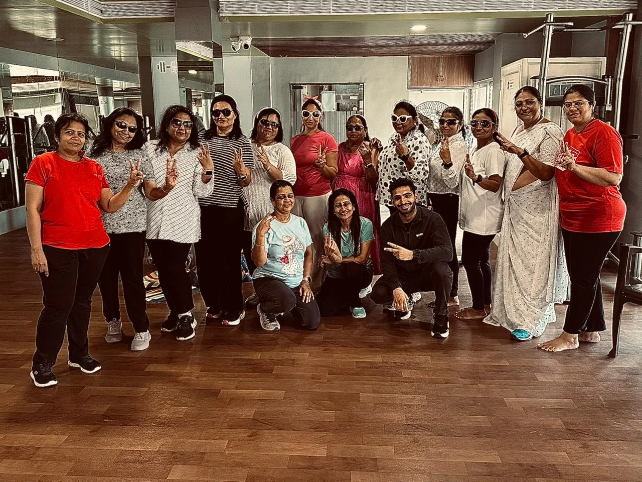 Vala's Gym members at a retro theme event